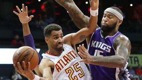 October 31, 2016 ATLANTA: Kings DeMarcus Cousins defends against Hawks Thabo Sefolosha under the basket during the second period in an NBA basketball game on Monday, Oct. 31, 2016, in Atlanta. Curtis Compton /ccompton@ajc.com