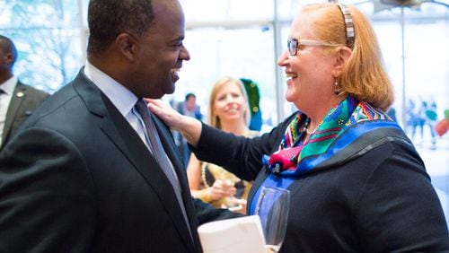 Virginia Hepner speaks to Atlanta Mayor Kasim Reed at a ceremony earlier this month announcing the completion of the Transformation fund-drive. The campaign was aided by a $1 million gift from the city of Atlanta. Photo: Woodruff Arts Center