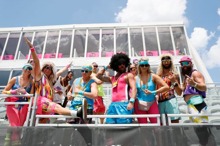 Colorful beach volleyball fans were seen in the stands during the AVP Gold Series Atlanta Open beach volleyball tournament Sunday at Atlantic Station. (Miguel Martinez / miguel.martinezjimenez@ajc.com)