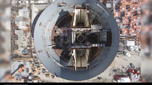 Bond rating firms said they’re reviewing the debt ratings of Georgia Power and Plant Vogtle’s other owners after the project’s key contractor, Westinghouse Electric, filed bankruptcy last week. This is an aerial view of the Unit 4 reactor under construction at the site. Photo: Georgia Power