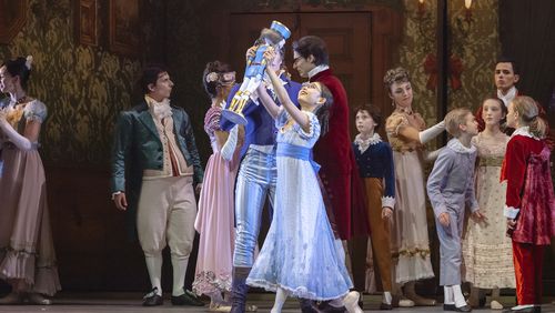 As young Marie, Remi Nakano admires her gift in Atlanta Ballet’s holiday classic "The Nutcracker,' which will debut Dec. 4 at the Cobb Energy Performing Arts Centre.
Courtesy of Atlanta Ballet / Kim Kenney,