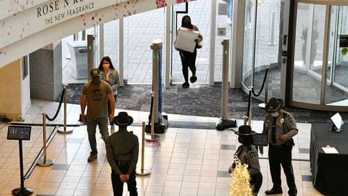 Security enhancement including metal detectors added at Lenox Square on December 29, 2020. Lenox Square, in the heart of Buckhead, has been the site of numerous shooting incidents in the past two years. The Atlanta Police Department has a mini-precinct inside the mall, which has increased security.  (Hyosub Shin / Hyosub.Shin@ajc.com)