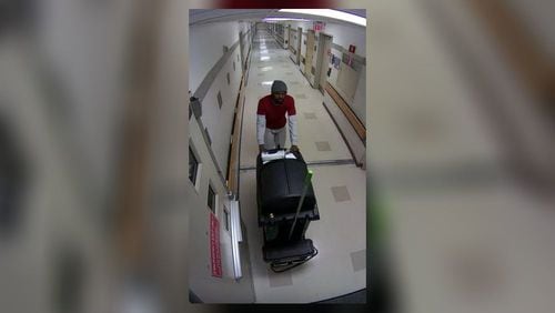 Atlanta police said Thomas Miller posed as a janitor at Grady Memorial Hospital before stealing an employee's iPad and wallet from a locked room.