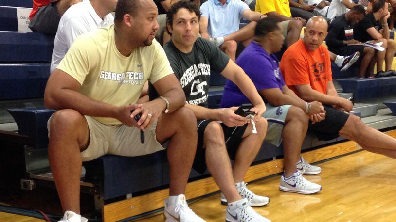 Georgia Tech coach Josh Pastner (gray shirt) and assistant coach Tavaras Hardy (gold) watch an AAU game in Las Vegas July 27, 2017.