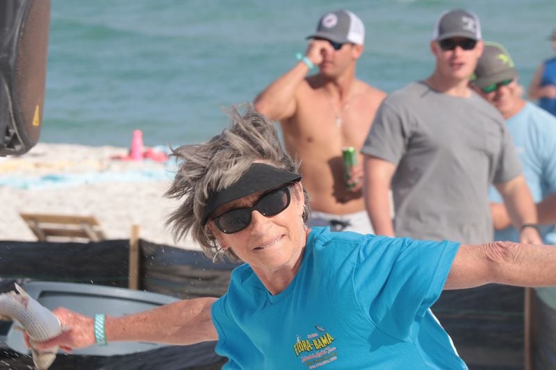 The Interstate Mullet Toss is a huge annual springtime party/competition on the beach at the Flora-Bama Lounge to see who can toss a fish the farthest across the state line.
Courtesy of Gulf Shores & Orange Beach Tourism