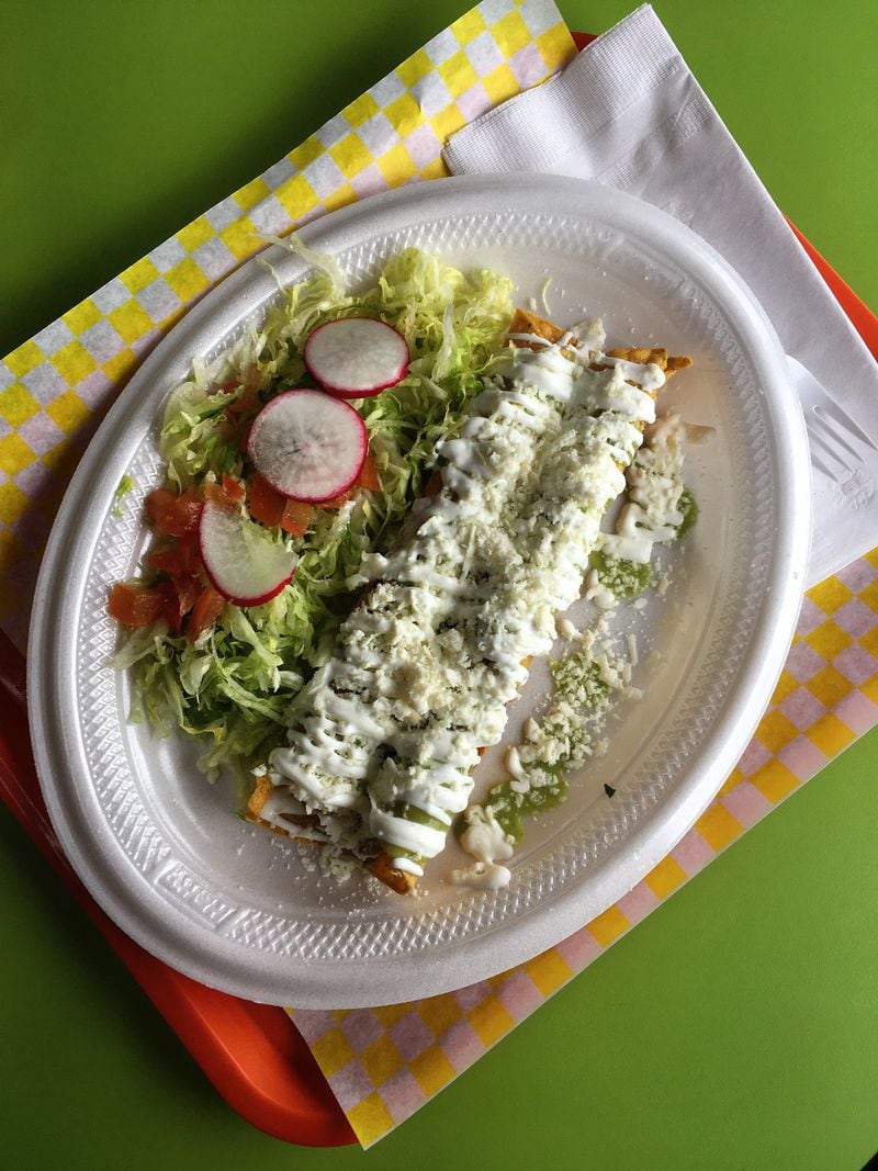 Flautas at Tortas Factory del D.F. are fried crisp and covered in sour cream. CONTRIBUTED BY WYATT WILLIAMS