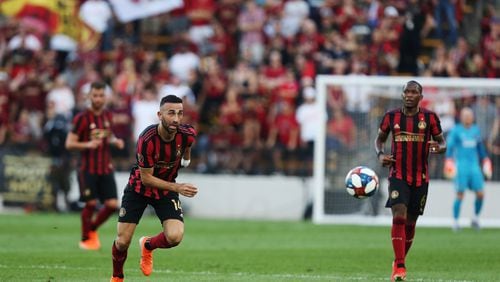 Justin Meram, 14, midfielder for Atlanta United, dribbles the ball during the first half of a match between Atlanta United and Saint Louis FC at Kennesaw State University in Kennesaw, Georgia on Wednesday, July 10, 2019. Atlanta United and Saint Louis  FC were tied 0-0 at the end of the first half. Christina Matacotta/Christina.Matacotta@ajc.com