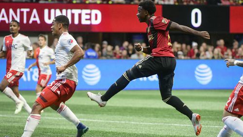 Atlanta United's George Bello follows through on a goal-scoring kick against the New England Revolution Saturday, Oct. 6, 2018, at Mercedes-Benz Stadium in Atlanta.