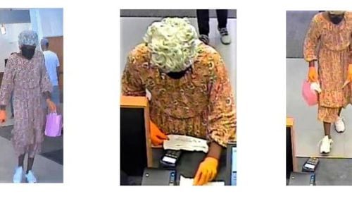 A man is accused of robbing a Chase Bank branch in McDonough while disguised as a woman, authorities said.