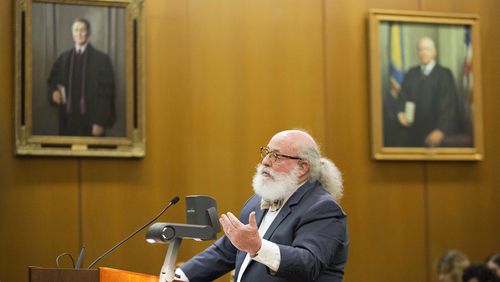 Attorney Alan Begner, representing a Ku Klux Klan group, argues before the Georgia Court of Appeals on whether the state violated the group's constitutional rights by denying its application in a highway cleanup program Thursday, July 9, 2015, in Atlanta. The Georgia Court of Appeals heard arguments in the case Thursday and will issue a decision in the coming months. The Georgia group's application for the Adopt-A-Highway program was denied in 2012. The American Civil Liberties Union Foundation sued on the group's behalf, saying its right to free speech was violated. (AP Photo/David Goldman)