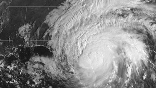 This image provided by NOAA. taken Oct. 7, 2016, shows Hurricane Matthew over the Southeastern part of the U.S. (NOAA via AP)