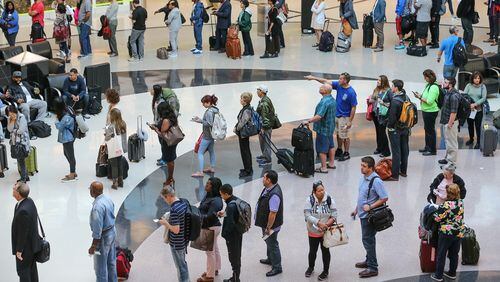 Monday lines at Hartsfield-Jackson International Airport stretched a long way.
