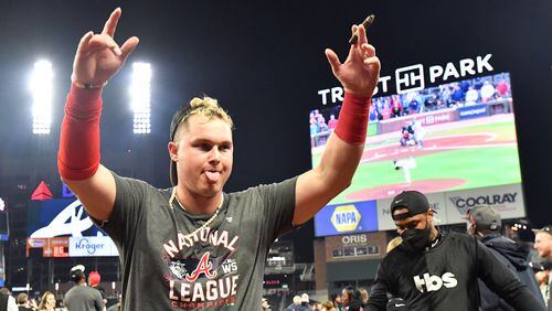 Braves right fielder Joc Pederson celebrates the Braves' 4-2 win in Game 6 of the NLCS against the Los Angeles Dodgers to advance to the World Series Saturday, Oct. 23, 2021, at Truist Park in Atlanta. (Hyosub Shin / Hyosub.Shin@ajc.com)