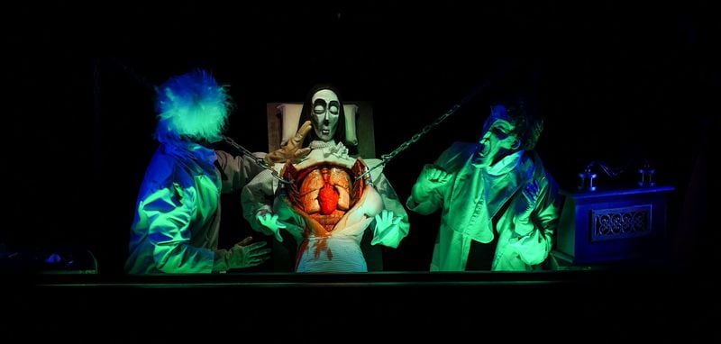 A doctor and his assistant attempt to bring the doctor’s daughter back to life in “A Horrific Experiment,” one of the more gruesome elements of “The Ghastly Dreadfuls” at the Center for Puppetry Arts. CONTRIBUTED BY CENTER FOR PUPPETRY ARTS