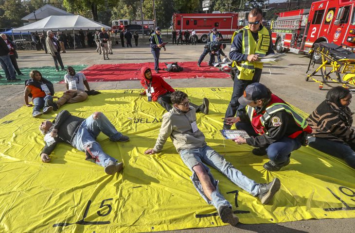 About 50 people volunteered to act as victms  in realistic disaster scenarios and scenes during the emergency preparedness training session Thursday, Oct. 19, 2023. (John Spink / John.Spink@ajc.com) 

