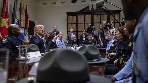 Brian Jack is standing to President Donald Trump's right at a recent meeting with Georgia first-responders. AP file.