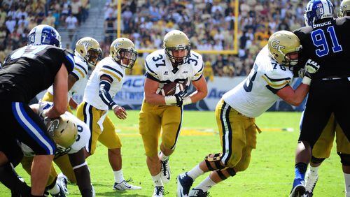Behind blocks like these, Georgia Tech finished No. 1 in the country in rushing last season with a school-record 342.1 yards per game. The Tech offensive line aims to repeat that top finish. (Photo by Scott Cunningham/Getty Images)