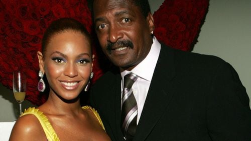 Singer Beyonce Knowles poses with her father and manager Matthew Knowles at the 'Beyonce: Beyond the Red Carpet auction presented by Beyonce and her mother Tina Knowles along with the House of Dereon to benefit the VH1 Save The Music Foundation June 23, 2005 in New York City.  (Photo by Frank Micelotta/Getty Images)