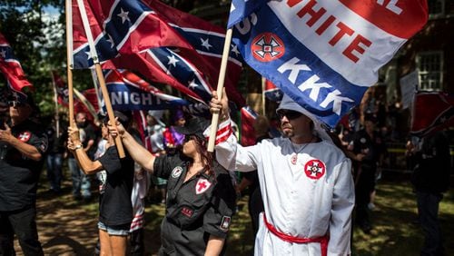 CHARLOTTESVILLE, VA - JULY 08: The Ku Klux Klan protests on July 8, 2017 in Charlottesville, Virginia. The KKK is protesting the planned removal of a statue of General Robert E. Lee, and calling for the protection of Southern Confederate monuments. (Photo by Chet Strange/Getty Images)