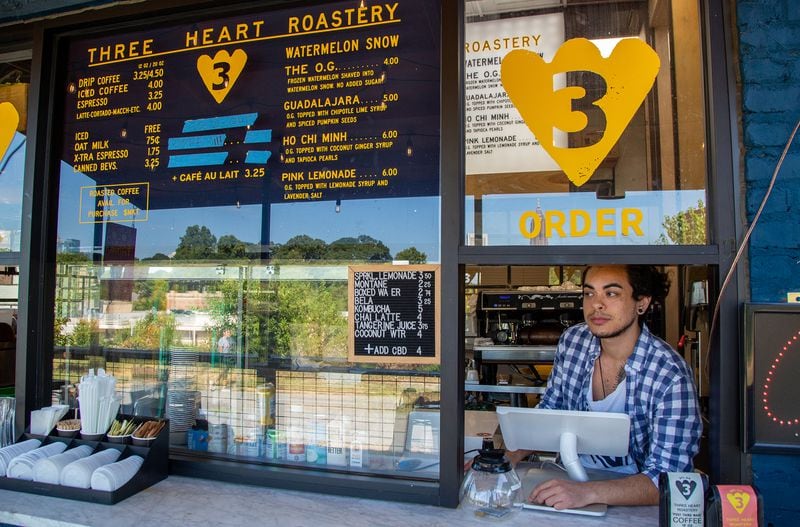 TK Hadman works at Three Heart Coffee Roasters on the Beltline near Ponce City Market in Atlanta on Thursday August 22nd, 2019. He shares his thoughts on e-scooters. The Beltline started out prohibiting motorized vehicles. In January, the Atlanta City Council passed a law allowing for e-scooters to be used on the trails. Does this compromise the Beltline's purpose?  (Photo by Phil Skinner)