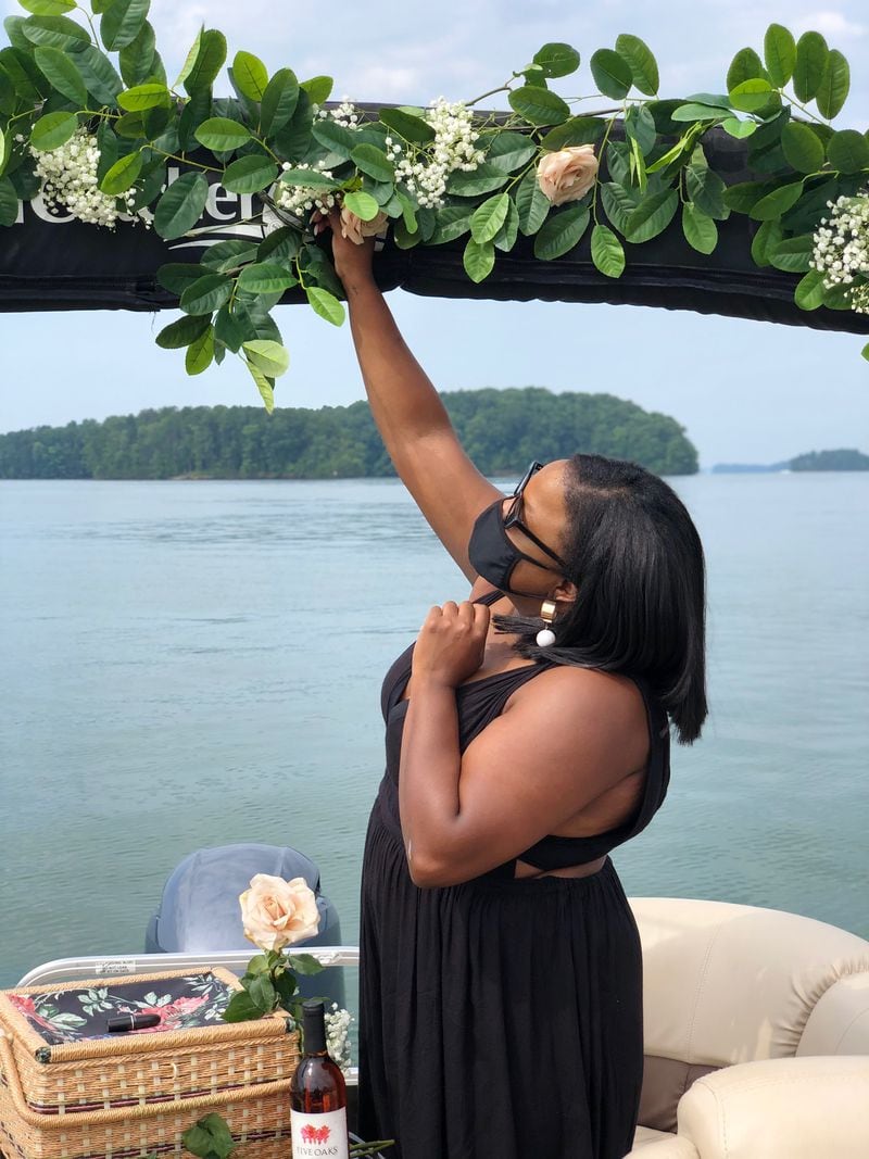On a recent July weekend, Daniele Mays and friends attended a boat ride party on Lake Lanier. The party was limited to nine people. Most wore masks. Mays, an event planner, said people are having to become more creative with their social gatherings and keeping an eye toward safety in the age of COVID-19.