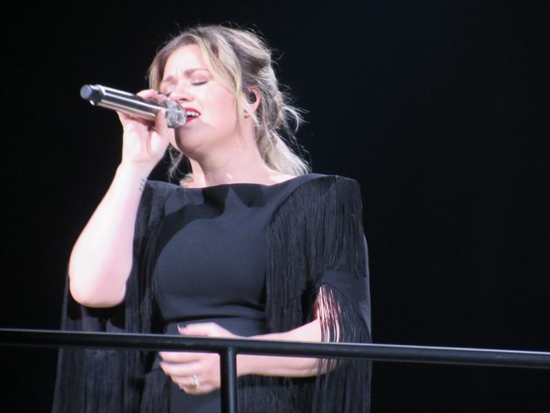 Kelly Clarkson sings "Run Run Run" during her "Meaning of Life' tour stop at Infinite Energy Arena in Duluth March 28, 2019.