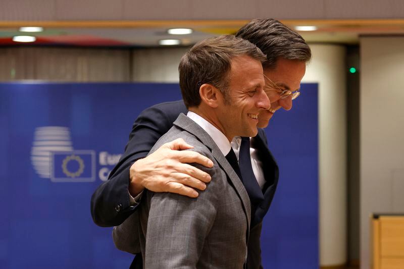 Netherland's Prime Minister Mark Rutte, right, speaks with French President Emmanuel Macron during a round table meeting at an EU summit in Brussels, Wednesday, April 17, 2024. European leaders' discussions at a summit in Brussels were set to focus on the bloc's competitiveness in the face of increased competition from the United States and China. Tensions in the Middle East and the ongoing war between Russia and Ukraine decided otherwise and the 27 leaders will dedicate Wednesday evening talks to foreign affairs. (AP Photo/Omar Havana)