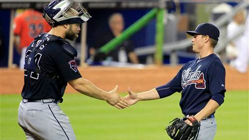 Atlanta Braves catcher Evan Gattis, left, congratulates relief pitcher Shae Simmons after they defeated the Miami Marlins 4-2 in a baseball game in Miami, Sunday, June 1, 2014. (AP Photo/Joe Skipper) Promising rookie Shae Simmons, being congratulated by catcher Evan Gattis after a game in Miami, has been thrust into immediate high-leverage situations in a bullpen that's not been up to its standards of recent seasons (AP photo)