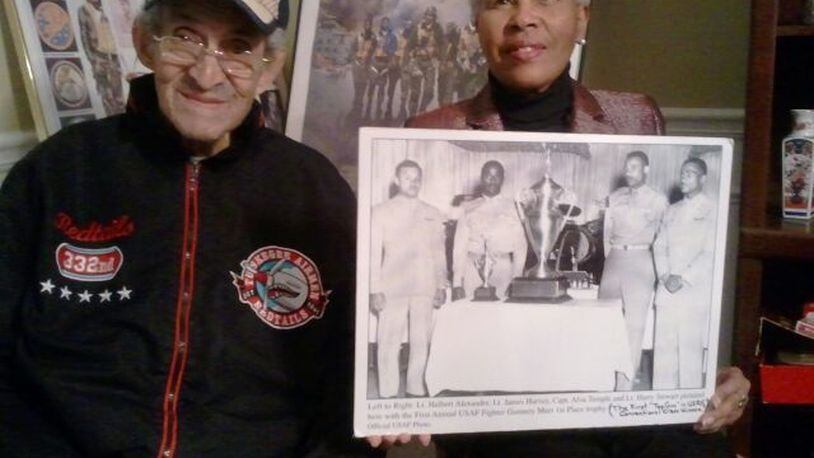 Zellie Orr with Tuskegee Airman Norris Connally and his artifacts. Photo credit: Geraldine Gilliam.