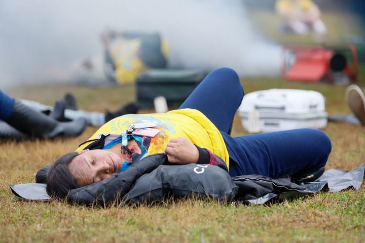 A fake victim is seen lying on the ground waiting for first responders as Hartsfield-Jackson International Airport held a full-scale disaster drill with Atlanta Firefighters, law enforcement, rescue personnel, and nearly 70 volunteers who participated in a triennial exercise known as “Big Bird” on Wednesday, March 6, 2024.

Miguel Martinez /miguel.martinezjimenez@ajc.com
