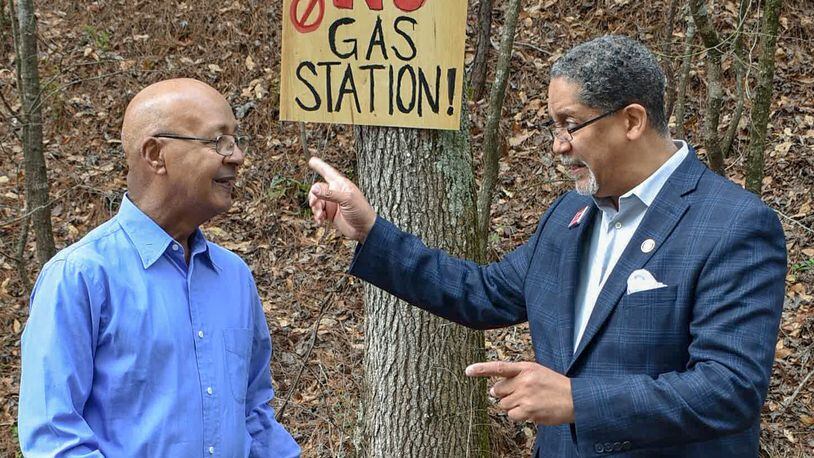 Stonecrest Mayor Jason Lary (right) and Councilman George Turner visit the site of a proposed gas station and convenience store.