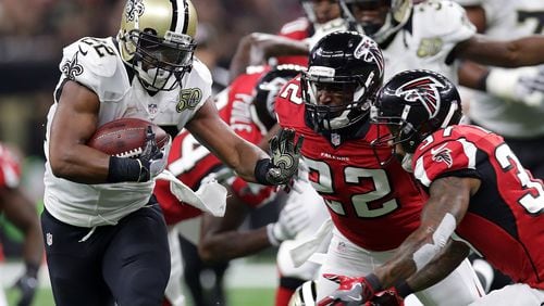 NEW ORLEANS, LA - SEPTEMBER 26: Mark Ingram #22 of the New Orleans Saints is tackled by Keanu Neal #22 of the Atlanta Falcons at the Mercedes-Benz Superdome on September 26, 2016 in New Orleans, Louisiana. (Photo by Chris Graythen/Getty Images)