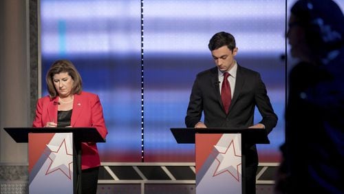 Candidates in Georgia’s 6th Congressional District race Republican Karen Handel, left, and Democrat Jon Ossoff prepare to debate Tuesday, June 6, 2017, in Atlanta. The two meet in a June 20 special election.(Branden Camp/Atlanta Journal-Constitution via AP) AJC FILE PHOTO