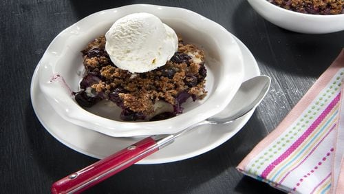 Try Lemon Blueberry Brown Betty topped with a scoop of frozen nonfat yogurt ice. (Tammy Ljungblad/Kansas City Star/TNS)