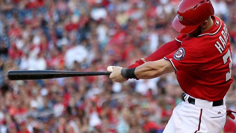 Bryce Harper #34 of the Washington Nationals hits a walk off home run in the ninth inning against the Atlanta Braves at Nationals Park on May 9, 2015 in Washington, DC. The Washington Nationals won, 8-6. (Photo by Patrick Smith/Getty Images)