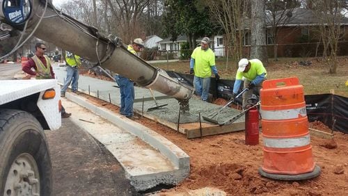 Cobb County will install sidewalks along Ebenezer Road and Maybreeze Road for $1.5 million. AJC file photo