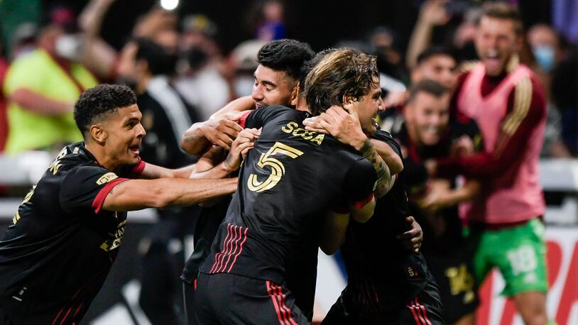 Atlanta United players react to a goal scored by Marcelino Moreno in the final minuets of their game Saturday, May 15, 2021 at Mercedes-Benz Stadium in Atlanta. (PHOTO/Daniel Varnado)
