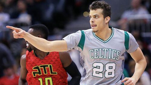Celtics guard R.J. Hunter points to a teammate after he scored against the Hawks on a good pass in a basketball game on Tuesday, Nov. 24, 2015, in Atlanta. Curtis Compton / ccompton@ajc.com