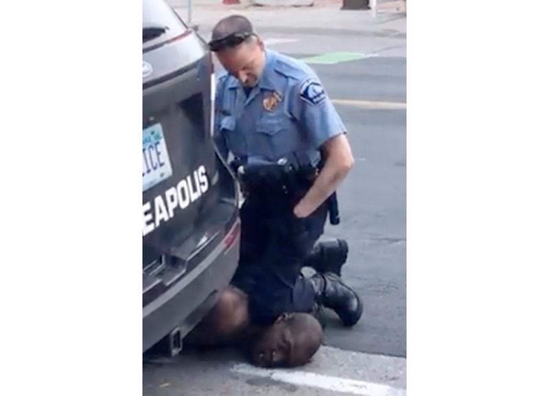 FILE - In this Monday, May 25, 2020, file frame from video provided by Darnella Frazier, then-Minneapolis Police Officer Derek Chauvin kneels on the neck of George Floyd, a handcuffed man who was pleading that he could not breathe. Floyd died after Chauvin's knee was on Floyd's neck for about nine minutes. (Darnella Frazier via AP, File)