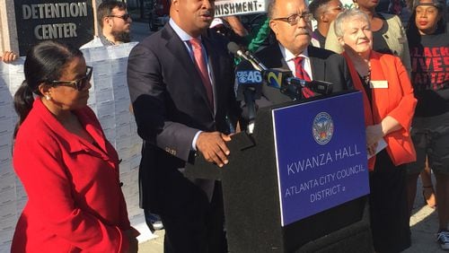 Atlanta City Councilman and mayoral candidate Kwanza Hall leads a rally Friday focused on changing possession laws for small amounts of marijuana.