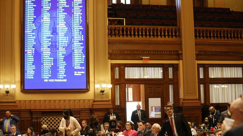 Members of the Georgia House of Representatives vote on a bill. Miguel Martinez for The Atlanta Journal-Constitution