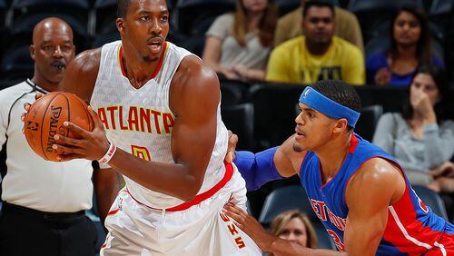 ADwight Howard of the Hawks looks to drive against Tobias Harris of the Pistons at Philips Arena on October 13, 2016 in Atlanta, Georgia. (Photo by Kevin C. Cox/Getty Images)