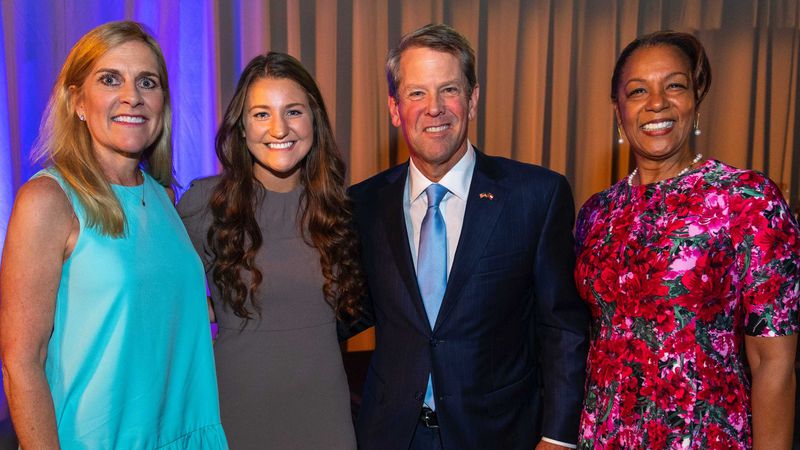 From left, First Lady Marty Kemp, Georgia Gwinnett College nursing student Autumn Musgrave, Gov. Brian Kemp and GGC President Jann Joseph pose for a picture on Wed., Oct. 13, 2021 at the University System of Georgia's annual fundraising gala. Musgrave was the keynote student speaker who shared how receiving a scholarship is helping her overcome obstacles and pursue her degree. PHOTO CREDIT: University System of Georgia.