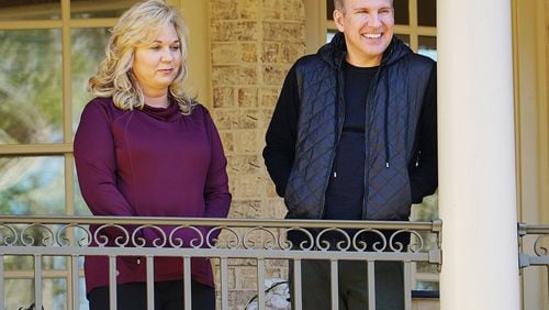 CHRISLEY KNOWS BEST -- "Moving On" Episode 406 -- Pictured: (l-r) Julie Chrisley, Todd Chrisley -- (Photo by: Annette Brown/USA Network)