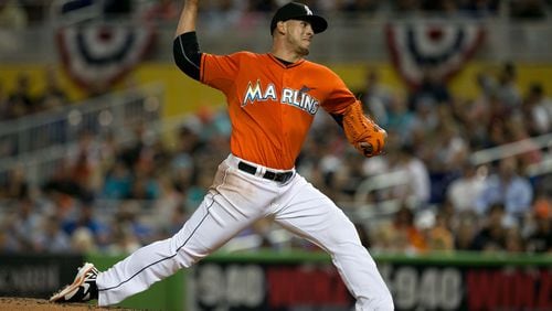 Miami Marlins starting pitcher Jose Fernandez pitches against the Colorado Rockies on Opening Day on March 31, 2014. Fernandez was driving his boat when it crashed and killed him and two passengers on Sunday, Sept. 25, 2016. (Allen Eyestone / The Palm Beach Post)