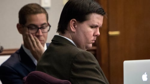 Justin Ross Harris during testimony at his trial in the Glynn County courthouse in Brunswick. At left is a member of his defense team, Carlos Rodriguez. (The Atlanta Journal-Constitution / Stephen Morton)
