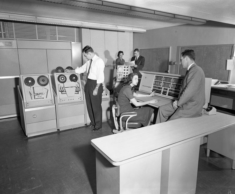 Social networking! The “Datatron 220” console drew a crowd to the computer room at Georgia Tech on March 2, 1959. Photo: Kenneth Rogers