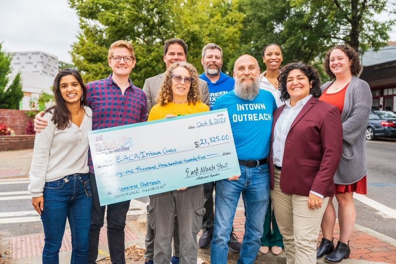 East Atlanta Village community leaders along with Council member Liliana Bakhtiari celebrate the more than $20,000 raised by the community to support their case manager pilot program.