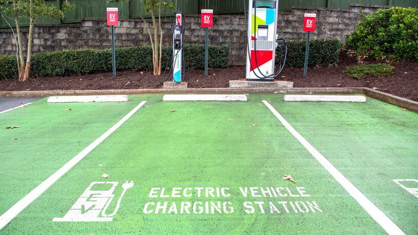 An EV charging station for electric vehicles is located in the parking lot of Krog Street Market on Thursday, February 17, 2022. STEVE SCHAEFER FOR THE ATLANTA JOURNAL-CONSTITUTION