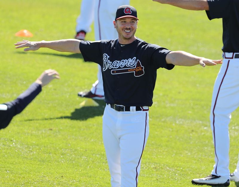 The warm spring sun finds Braves pitcher Scott Kazmir in a good mood early in camp. (Curtis Compton/ccompton@ajc.com)